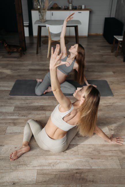 Woman performing a warrior yoga pose on a mat in a minimalist room.